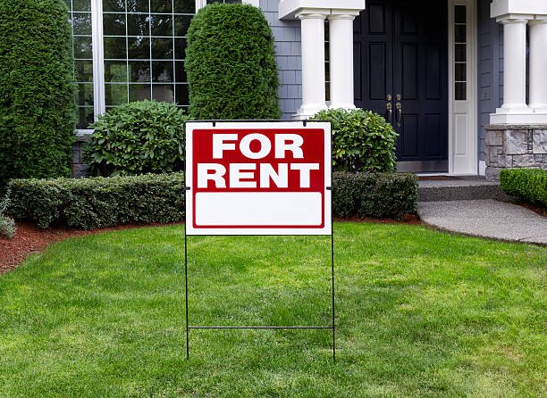 Real estate agent handing keys to a new homeowner